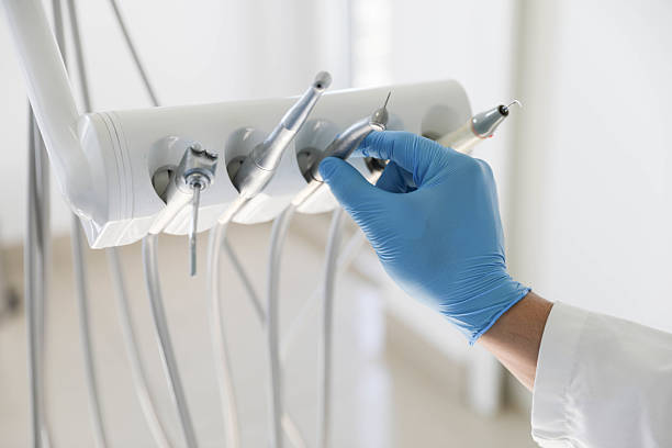 Professional Tooth Extraction technician working in Florham Park, NJ